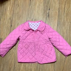 Pink puff jacket. Cute bow in back.